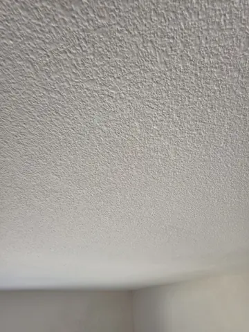 Close view of orange-peel ceiling texture